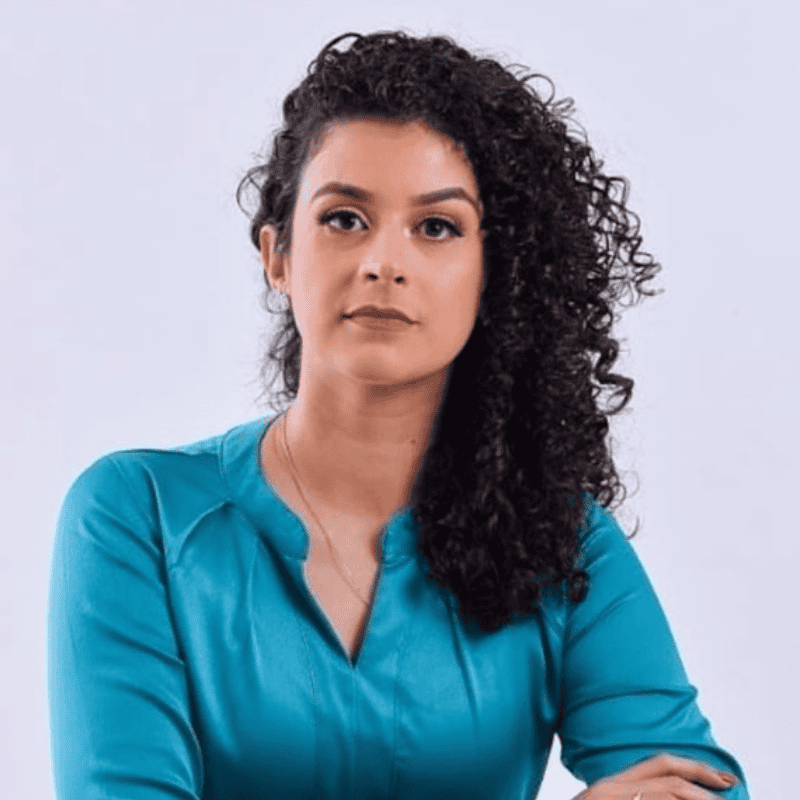 Dr. Arissa Vasconcelos, compassionate veterinarian skilled in small animal medicine, emergency care, and complex soft tissue surgery with a postgraduate degree.